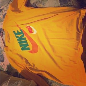 A high bright out nike shirt wore one time